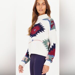 The Upside White and Multicolor Turtleneck Sweater ‘Pacha Clara’
